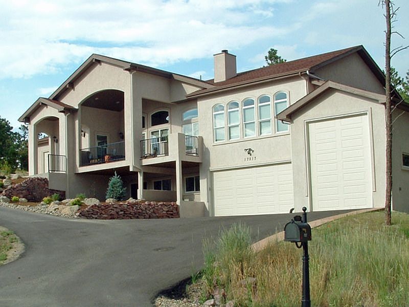 LOVELY STONE AND STUCCO MAINTENANCE FREE EXTERIOR