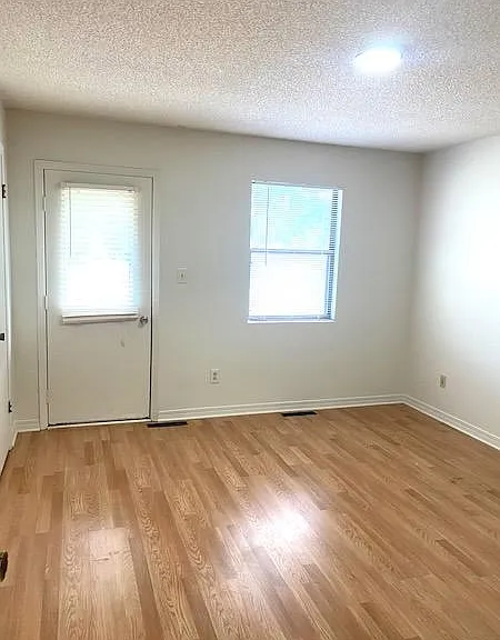 Bedroom with walk in closet and Balcony.