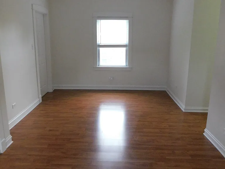 South view of family room. Flooring being replaced.