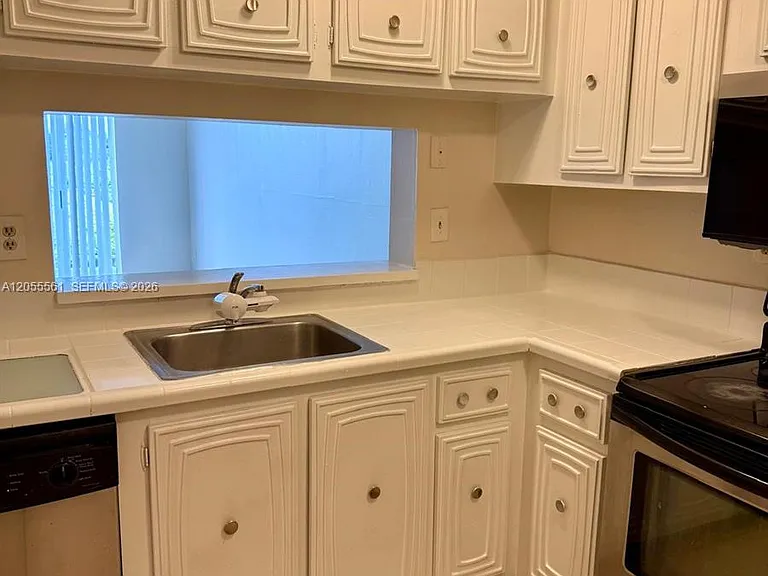 498 NW 165th Street Rd #D405 — Photo 3