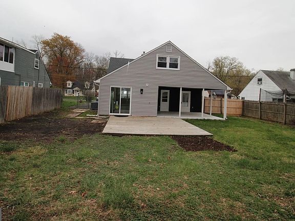 Fenced Yard with Deck and Covered Patio with Storage