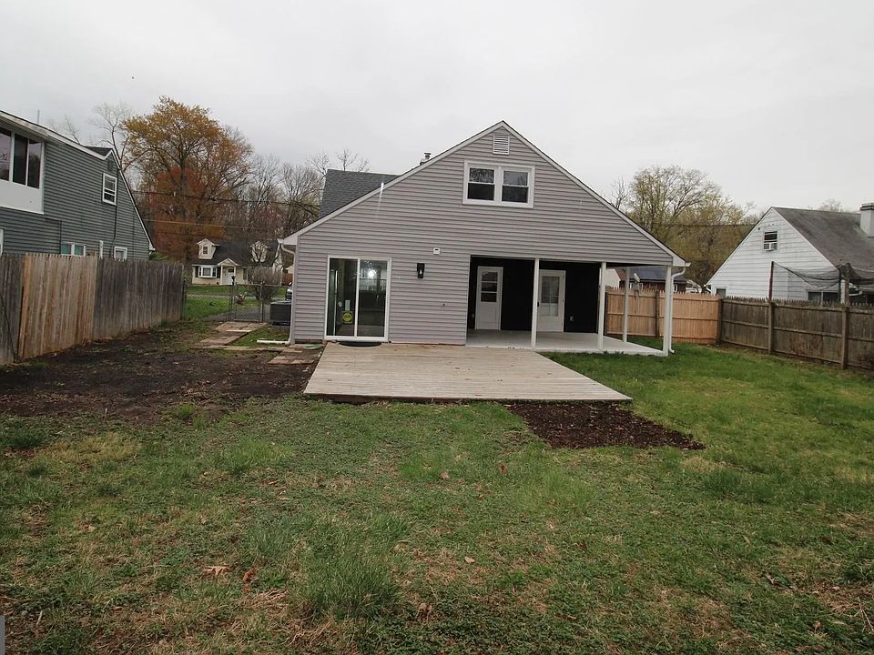 Fenced Yard with Deck and Covered Patio with Storage