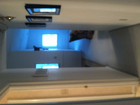Hallway to downstairs and kitchen