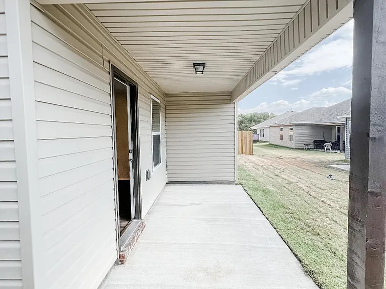 Large covered back patio for gamedays!