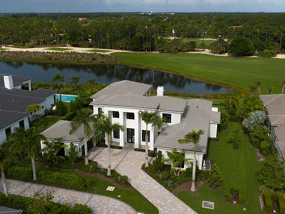 Home For Sale In Old Palm Golf Club