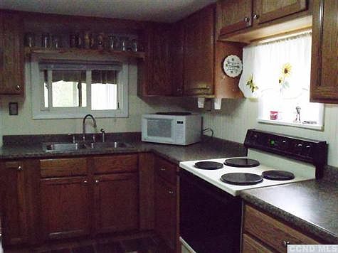 New cabinets, counters and appliances.