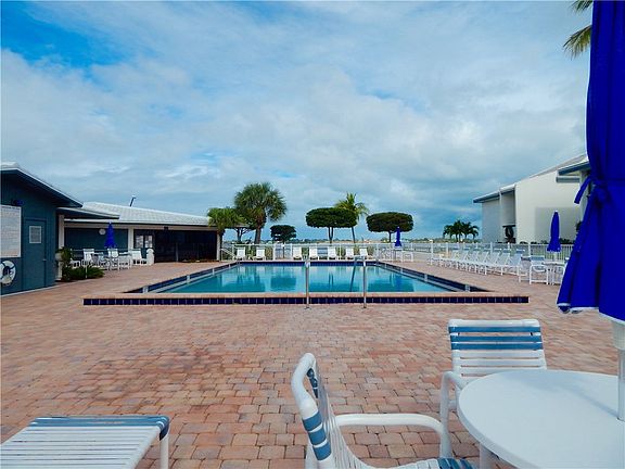 Community Pool on the River moments from this Condo