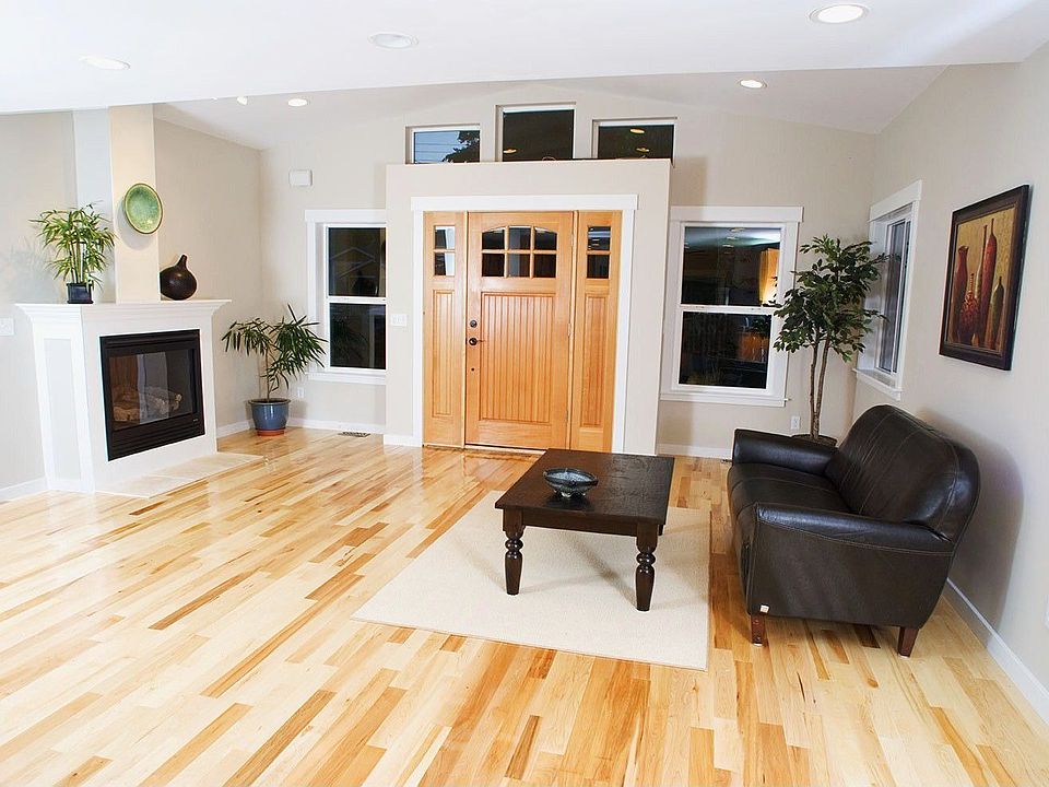 New maple hardwoods and vaulted ceilings are a few of the many features of thi
