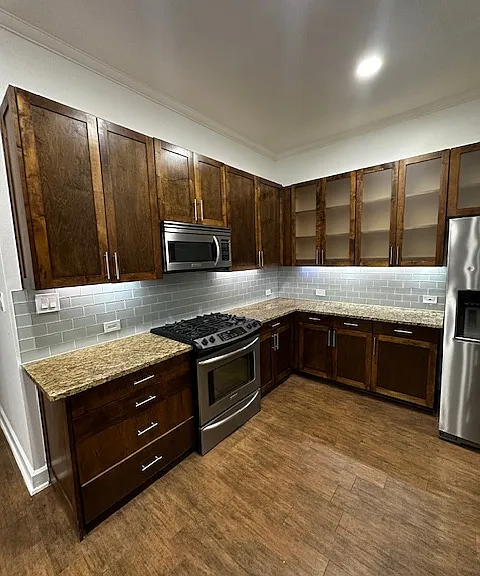 Kitchen with stainless steel appliances