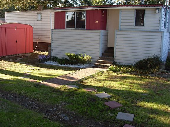 Brick walkway & storage shed