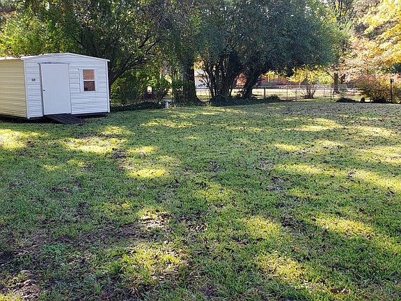 Nice storage building. Pecan tree in back yard.