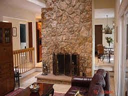 Spacious Fam. Rm. Stone Fireplace, & Built-in Bookcases