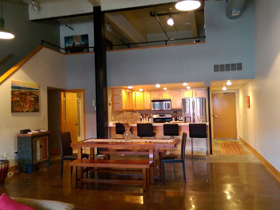 Loft open space. Kitchen looking out to living area.