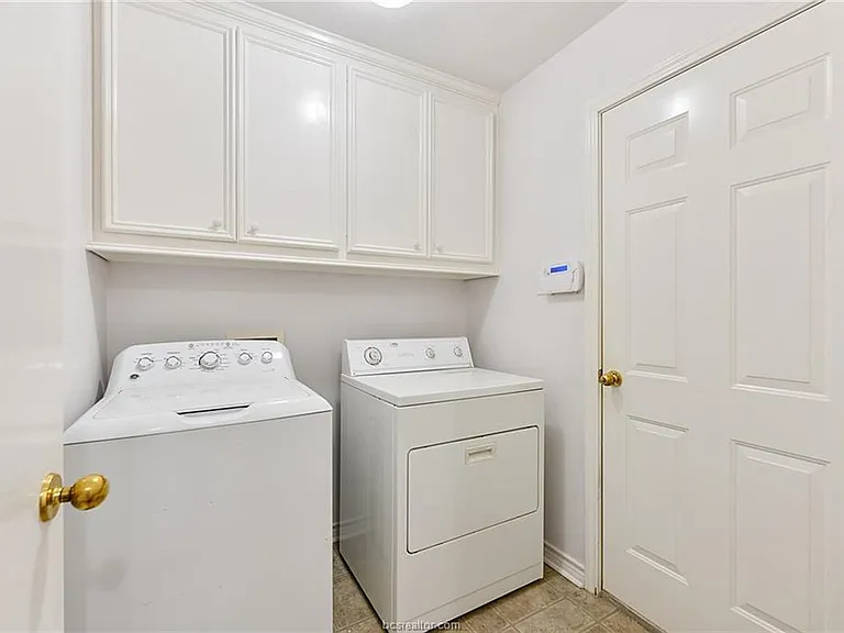 Laundry room with washer and dryer