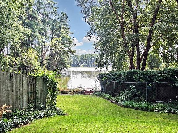 Large and private .29 acre lot has views of Mason Creek. Located in Granby Shores neighborhood.