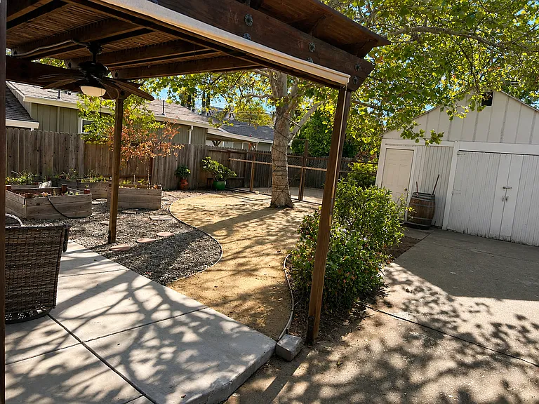 Back yard and storage shed.