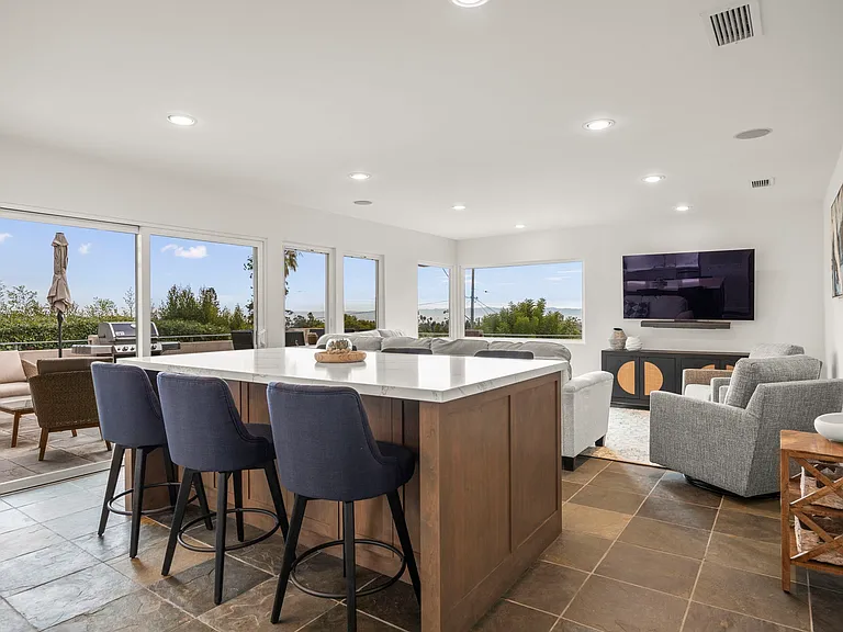 Bar height counter with seating for 6.