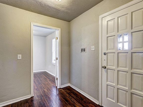 Entry hall and small bedroom