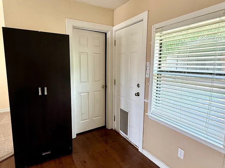 Transition into the laundry room or to the backyard.
Additional storage pantry space included.