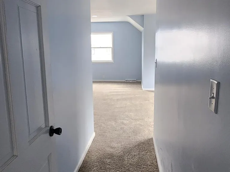 This is the entrance to the main and spacious bedroom upstairs. This one has its own full bathroom and a walk in closet