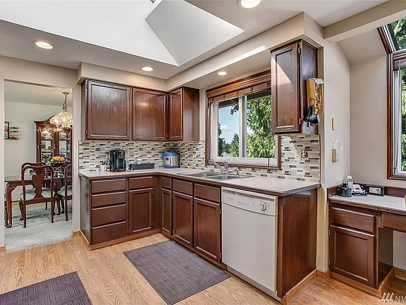 Plenty of cabinets and a dedicated planning space is the recipe for an organized kitchen space.  