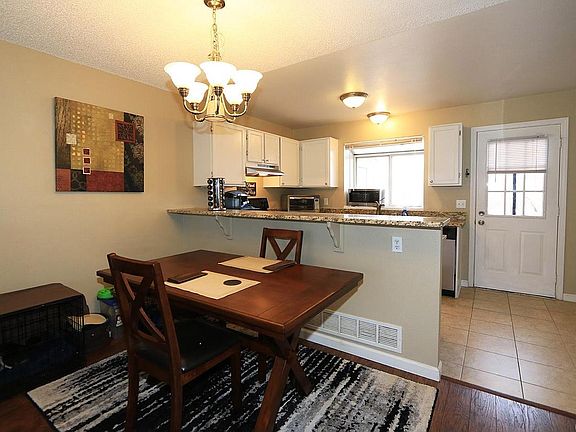 4th image of 9697 W Chatfield Ave Unit E