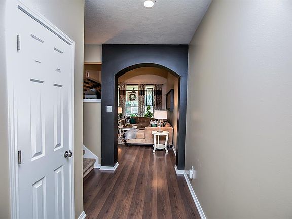 Beautiful arched entry into family room.