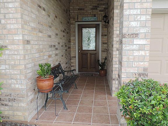 Tiled Entry way to Leaded Glass Front Door!