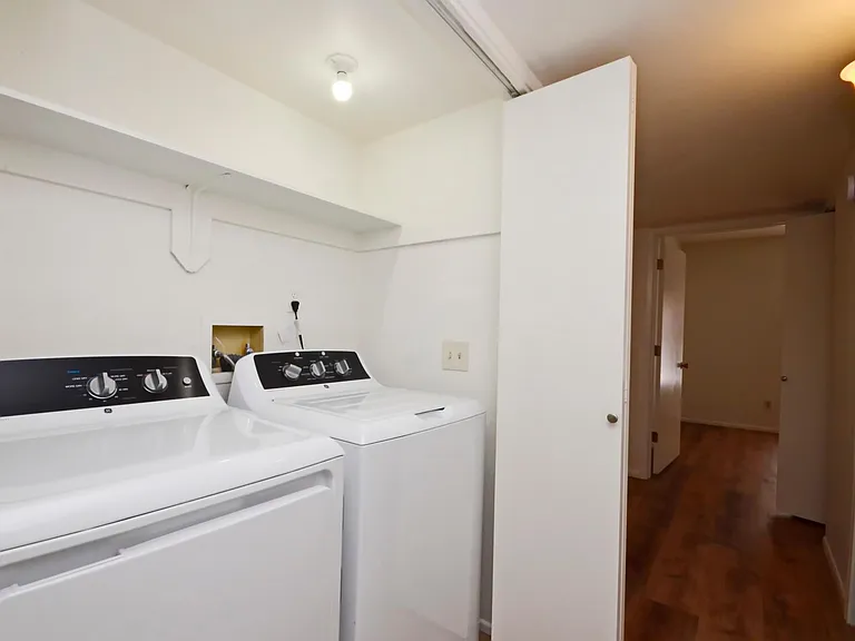 Laundry with brand new washer and dryer