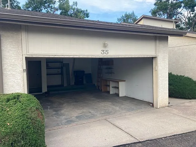 Oversize garage area with shelves for extra storage