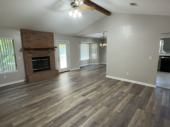 Spacious family room with gas burning fireplace