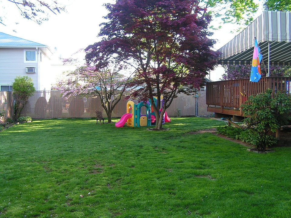 Large yard w/ fully canopied deck