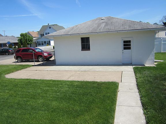 Walkway to Patio & Garage