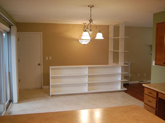 Dining Room and Home Organization space with lots of built-in storage. Access to deck with great views!