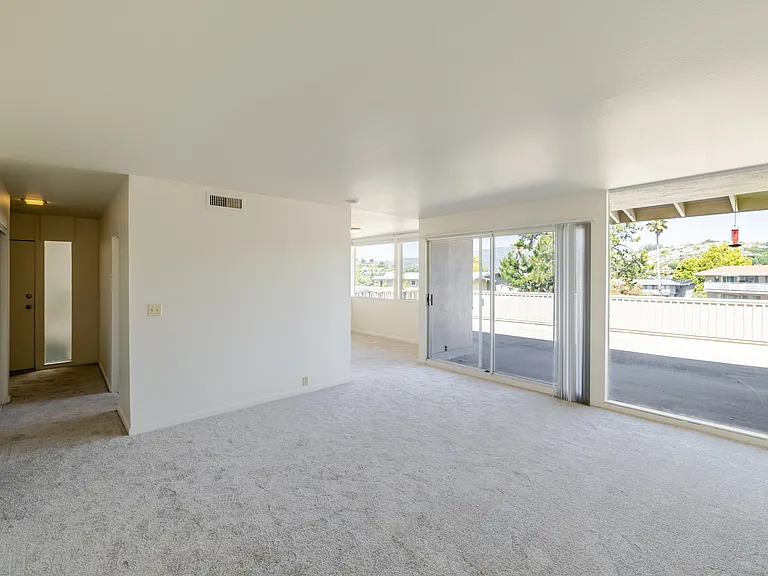 Spacious three-bedroom layout with oversized windows and seamless indoor-outdoor flow.