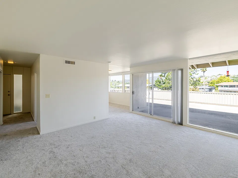 Spacious three-bedroom layout with oversized windows and seamless indoor-outdoor flow.
