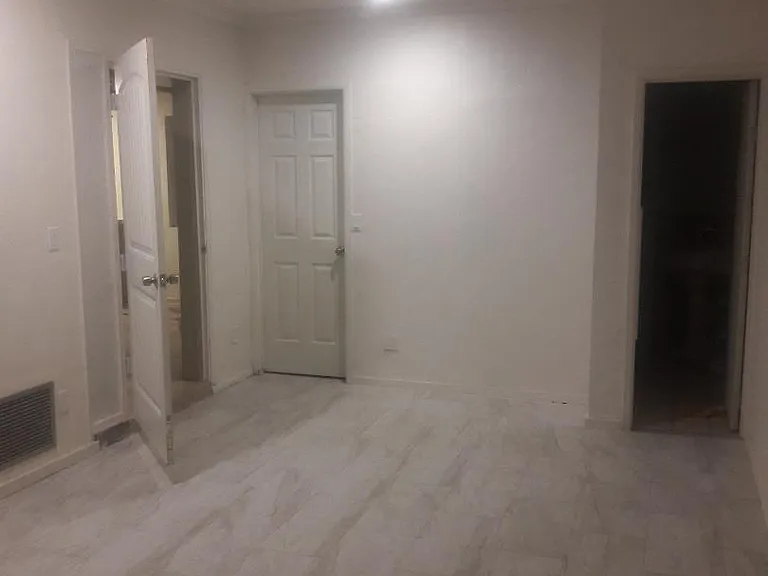 Master bedroom has an entrance to laundry room (also access from backyard)