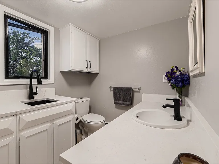 Main Floor 1/2 bath & laundry sink
