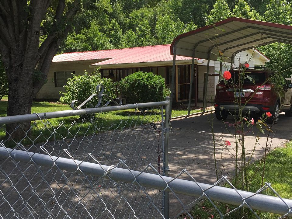 Screened porch, fenced yard, car port