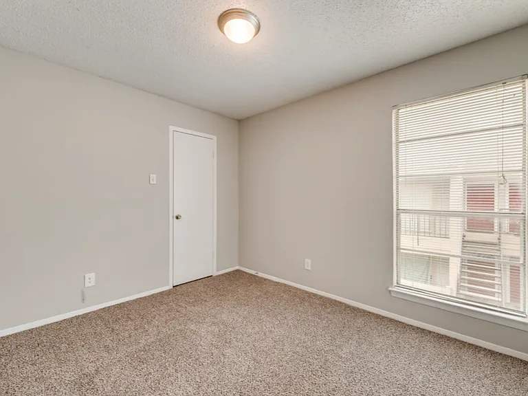 Comfortable bedrooms with natural light create a welcoming retreat.