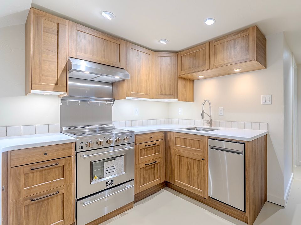 Brand new kitchen thoughtfully designed with ample cabinet space and stainless steel appliances