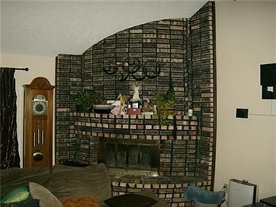 ALL BRICK WOOD BURNING FIREPLACE IN GREAT ROOM ON MAIN FLOOR.