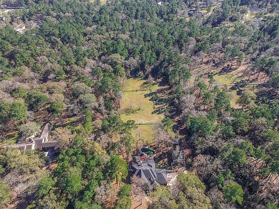 Expansive home site features 5 acres.