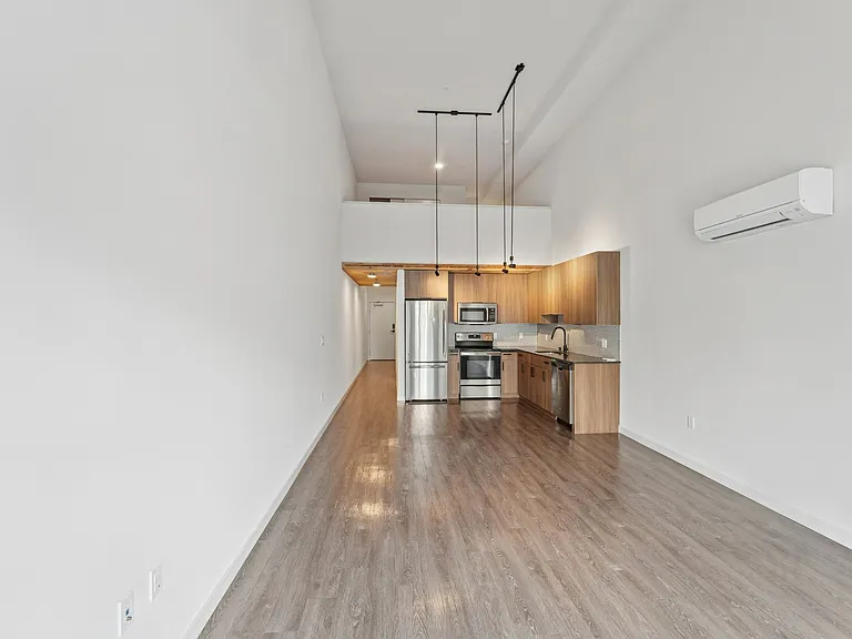 Let your style shine in this airy, open-concept home with soaring ceilings and modern finishes.