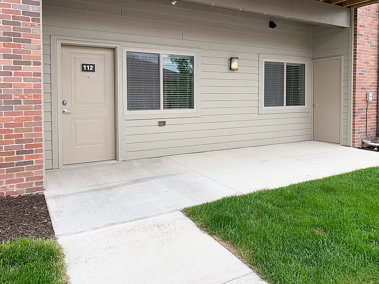 Step outside and enjoy the fresh air on your private patio, perfect for relaxing at any time of day.