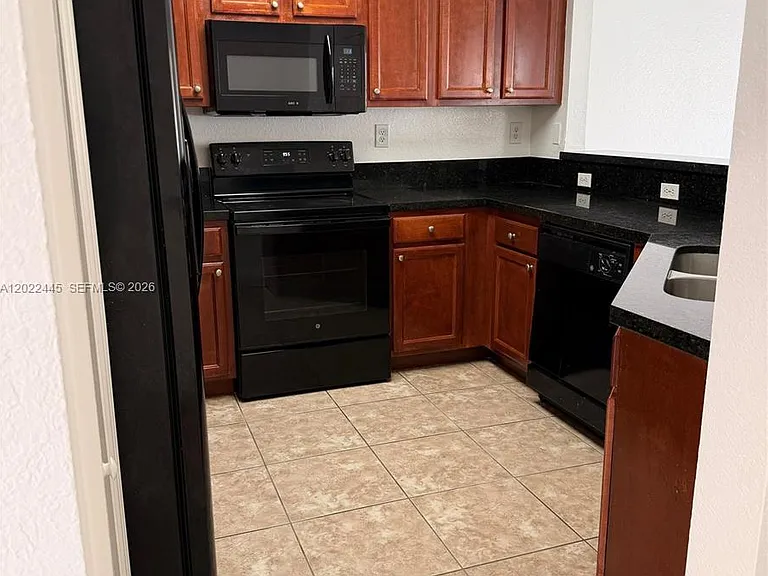 3172 SW 128th Ter #148 — Photo 2