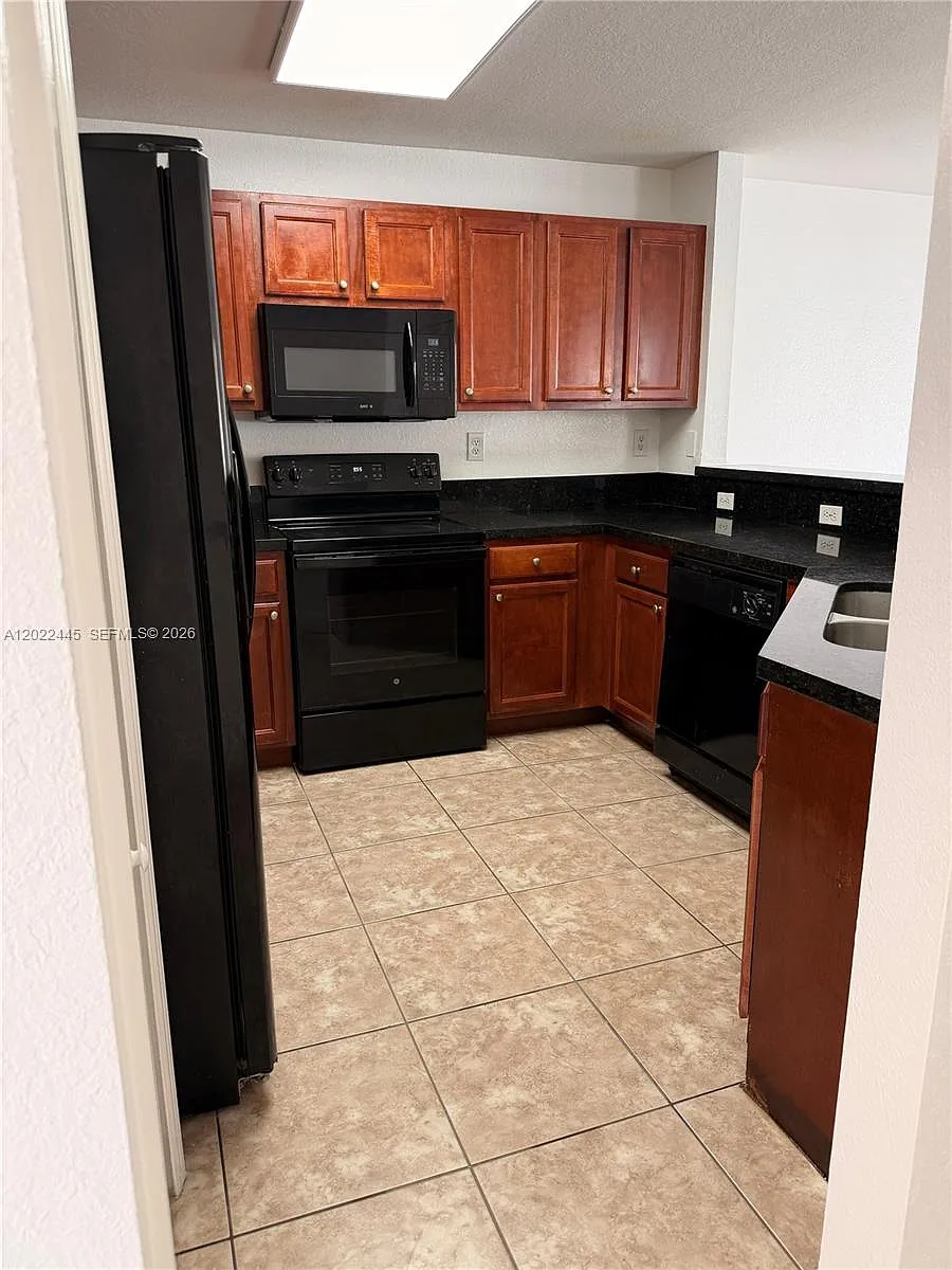Building Photo - 3172 SW 128th Ter #148