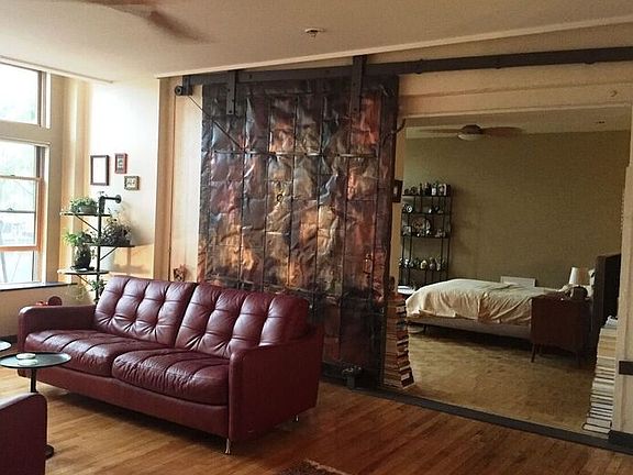 historic door leading to oversize bedroom/dressing area