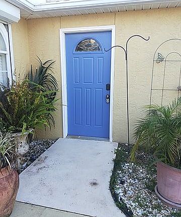 side door to spacious garage