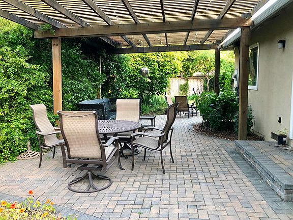 The patio is easily accessed by two sliding doors from the kitchen and great room.